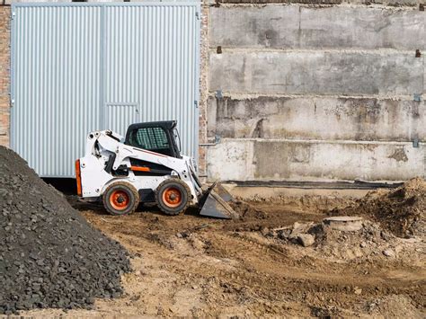 how to steer a skid steer|operating a bobcat skid steer.